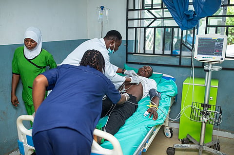 Doctors attend to a victim of a locally brewed alcoholic concoction commonly known as "Monkey Tail" at a hospital in Odigbo southern Nigeria, Thursday, Sept. 17, 2026. (AP Photo/Dapo Alley)
