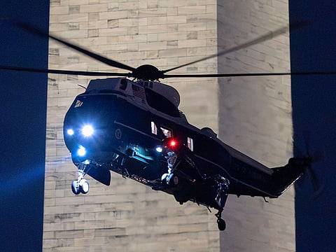 Marine One with President Donald Trump aboard arrives at the Ellipse just outside of the White House, in Washington.