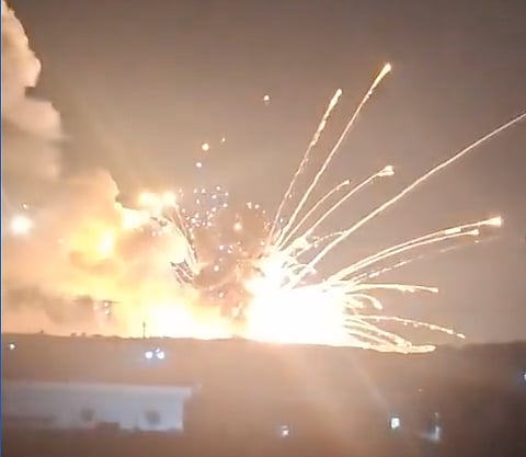It is not immediately clear what caused the massive explosion at a weapons depot which has shaken the Syrian countryside near Aleppo. The local governor has told people not to approach the site.