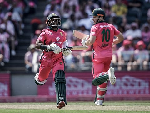 South Africa's Temba Bavuma (L) and David Miller (R) run between the wickets during the second ODI against Australia at the DP World Wanderers Stadium in Johannesburg on September 27, 2026.