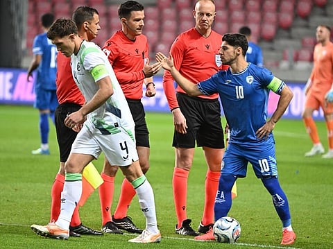 Republic of Ireland captain Dara O'Shea (L) turns away from Israel captain Manor Solomon (R) during the pre-match protocol before the UEFA Nations League Group B3 football match between Israel and the Republic of Ireland at Nagyerdei Stadium in Debrecen, Hungary, on September 27, 2026.