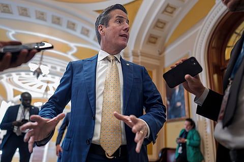 Sen. Bernie Moreno, R-Ohio, talks to reporters outside the chamber at the Capitol in Washington, Wednesday, Sept. 30, 2026. (AP Photo/J. Scott Applewhite)