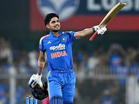 India's captain Shubman Gill celebrates after scoring a century (100 runs) during the second one-day international (ODI) cricket match between India and West Indies at the Barsapara Cricket Stadium in Guwahati on September 30, 2026.