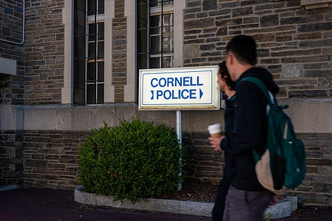 Students walk past Cornell Police headquarters on the Cornell University campus on September 30, 2026, in Ithaca, New York.