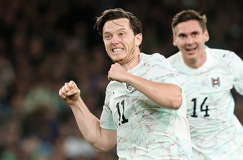 Austria's forward #11 Michael Gregoritsch celebrates scoring the team's second goal during their UEFA Nations League, League B - Group 3, football match between Republic of Ireland and Austria at the Aviva Stadium in Dublin, Ireland on October 1, 2026.