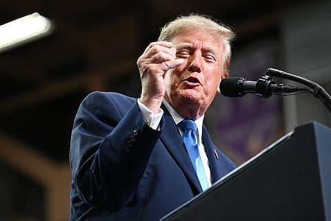 President Donald Trump speaks on stage at the Butler-Vandalia Student Activity Center during a campaign rally on October 03, 2026 in Vandalia, Ohio.
