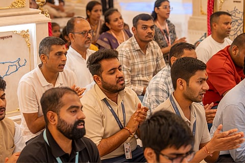Devotees and priests prayed for the injured pilot's swift and complete recovery