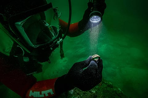 Bronze ring engraved with Lighthouse of Alexandria found in sunken royal palace