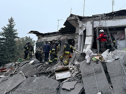 Rescuers conduct search and rescue operations following a Russian attack that struck a five-storey residential building and killed seven people, including three children, in Zaporizhzhia, Ukraine, on October 10, 2026.