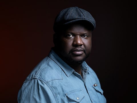 Haitian-born Quebecois writer, poet, and novelist Thelyson Orelien, poses for pictures during a photo session, in Paris on September 8, 2026.