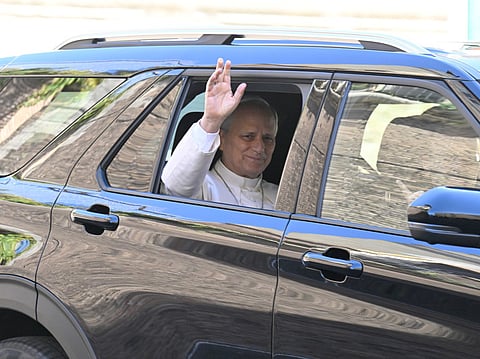 Pope Leo XIV leaves the Vatican before being admitted to Rome's Gemelli University Hospital for an operation to remove a lump from his lung, in the Vatican on 13 October 2026.