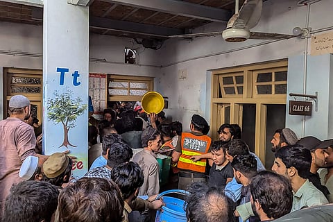 Twenty-one pupils and a teacher were killed on Thursday after a roof collapsed at a school in the northwest Pakistani city of Peshawar, a hospital official said.