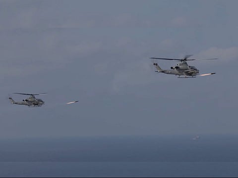 US attack helicopters fire missiles at a "spotter" dhow, suspected of being used to find and track marine vessels, including the US navy, in the Strait of Hormuz.