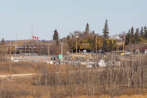 Flags at half mast at Canadian Forces Base Wainwright in Wainwright, Alberta, Canada, on October 18, 2026.
