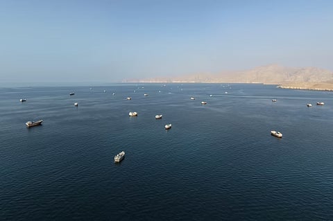 Ships recently anchored off Oman’s coast near the Strait of Hormuz.