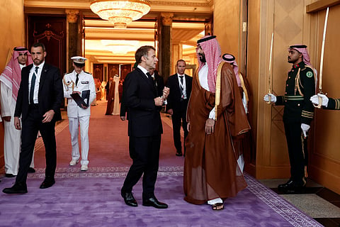 Saudi Crown Prince Mohammed Bin Salman accompanies French President Emmanuel Macron after a meeting at Al Yamamah Palace in Riyadh on October 21, 2026.