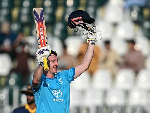 England's captain Harry Brook celebrates after scoring a century (100 runs) during the one-day international (ODI) tri-series cricket match between England and Sri Lanka at the Rawalpindi Cricket Stadium in Rawalpindi on October 22, 2026.