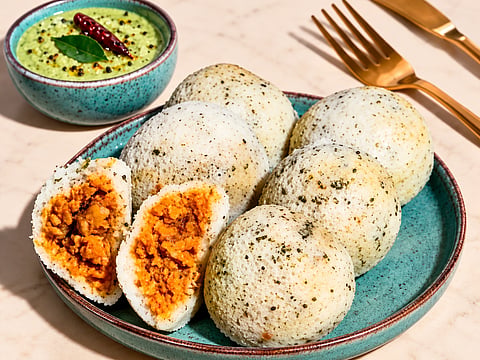 Viral butter chicken-stuffed idli combines the South Indian breakfast favourite with a rich, creamy North Indian curry filling, sparking debate among food lovers over this unusual fusion dish.