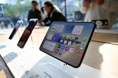The iPhone Duo is displayed at an Apple store in Beijing on October 23, 2026.