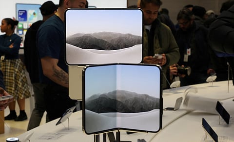 The new iPhone Duo is displayed on launch day at the Apple Fifth Avenue store in New York on October 23, 2026.