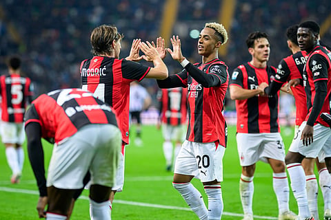 Milan’s English midfielder #20 Omari Hutchinson celebrates after scoring a goal during the Italian Serie A football match between Udinese and Milan at the Stadio Friuli in Udine on October 25, 2026.
