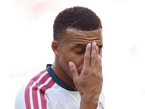Real Madrid's French forward #10 Kylian Mbappe gestures during the Spanish league football match between Club Atletico de Madrid and Real Madrid CF at the Metropolitano stadium in Madrid on September 20, 2026.