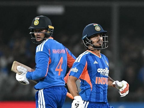 India's Ishan Kishan (R) and teammate Abhishek Sharma (L) run between the wickets during the third T20 international cricket match between India and West Indies at the Holkar Cricket Stadium in Indore on October 11, 2026.