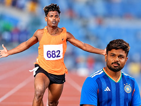 Kerala sprinter TM Atul, who broke a 15-year-old meet record in the 100m, and cricketer Sanju Samson, who is supporting the youngster’s training and sporting expenses.