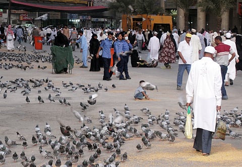 Pilgrims near the Masjid Al Haram in Mecca. The Umrah visa allows its holder to freely move between the holy cities of Mecca and Medina as well as all other Saudi cities during its validity period, the Ministry of Hajj and Umrah said.