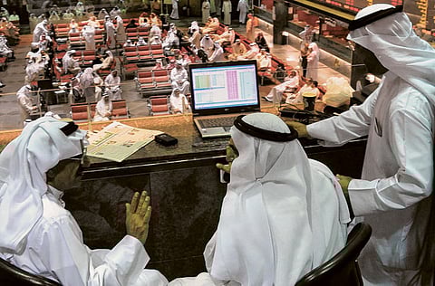 Investors at the Kuwait Stock Exchange. Kuwait’s stocks have clawed their way back from the devastating hits they took on March 1, when 3.2 billion dinars (about $10.5 billion) worth of value evaporated on fears that the COVID-19 pandemic would cause widespread and lasting damage to the economy.