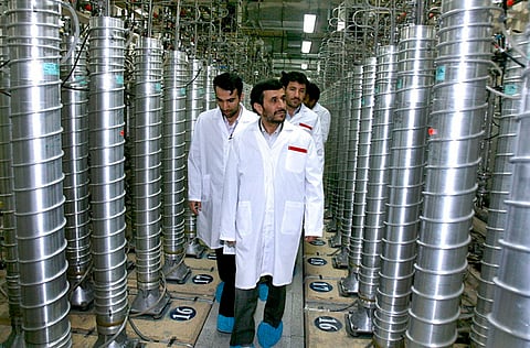 In this Tuesday 2008 file photo released by the Iranian President's Office, Ahmadinejad, visits the Natanz Uranium Enrichment Facility some 322 kilometres south of the capital Tehran, Iran.