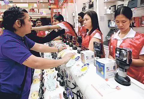 A mobile phones shop in Dubai. The businesses closing down can continue online sales and e-commerce activities during the closure period