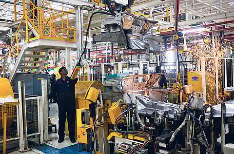 The Ford Motor factory on the outskirts of Chennai in southern India. The Dearborn, Michigan-based company raised new funds with a three-part debt offering, according to a regulatory filing.