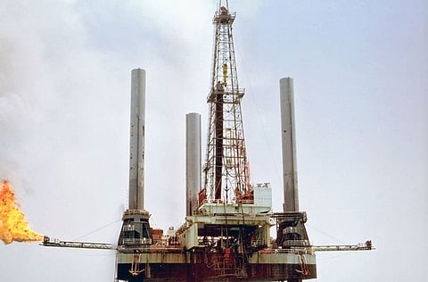 A drilling rig off the coast of Abu Dhabi. Investments in the energy sector will see their biggest fall this year as consumer spending on oil set to drop by $1 trillion in 2020 according to the International Energy Agency (IEA).