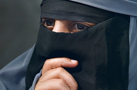 For illustrative purposes only. France's Kenza Drider, dressed in a niqab, speaks with reporters during a press conference in Montreuil, east of Paris, on Tuesday.