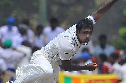 Indian cricketer Abhimanyu Mithun delivers a ball.
