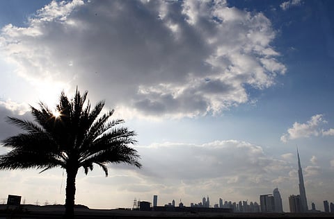 The Dubai skyline on a cloudy day.