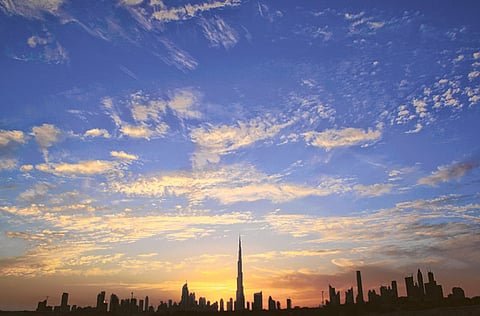 Towering icon: The Burj Khalifa against a brilliant Dubai skyline at dusk