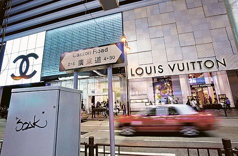 Owner of Louis Vuitton brand, Bernard Arnault saw a $4.8 billion dip in his personal fortunes after Monday's stock market swings. He wasn't the only one - even Amazon's Jeff Bezos lost some.