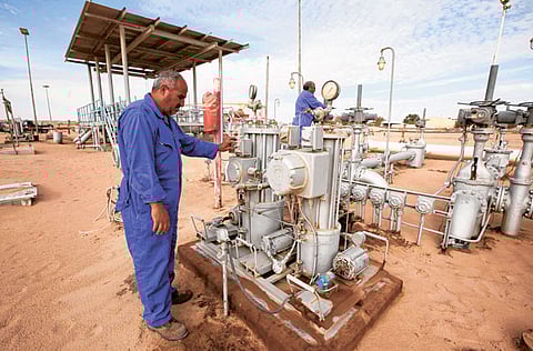 Equipment is monitored at the Amaal field in eastern Libya. Libya boosted oil production to a milestone of more than 1 million barrels a day, after civil war all but shut down the North African country's energy industry at the start of the year.