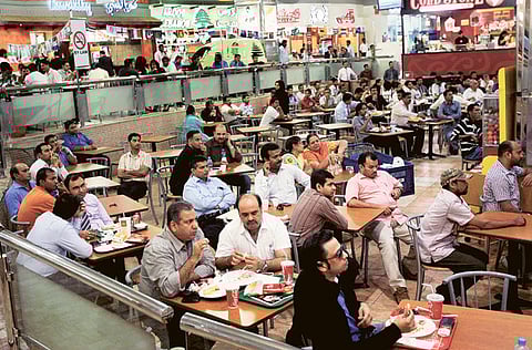 Diners at a foodcourt in a mall in Dubai. Small and mid-sized F&B outlets in Dubai are planning to cut their ties with online food ordering and delivery portals, to bring attention to the current fee sharing arrangement.