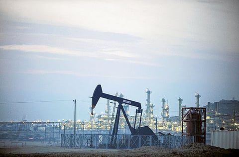 An oil pump operates in the Awali oilfield in Bahrain. Oil markets were given a fresh reminder of the challenges that still lie ahead this year, as prices took a tumble recently as the market continues to struggle with demand recovery.