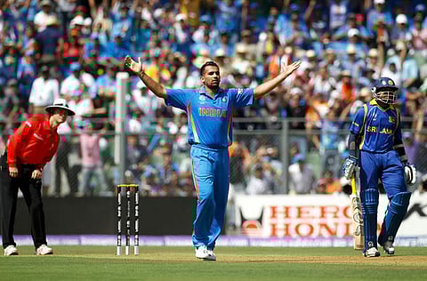 India's Zaheer Khan celebrates taking the wicket of Sri Lanka's Upul Tharanga during the 2011 ICC Cricket World Cup final in Mumbai.