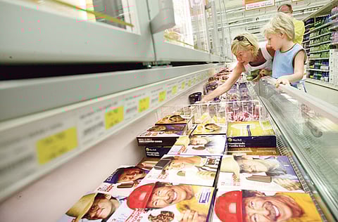 Customers shop at a supermarket in Dubai. For illustrative purposes only.