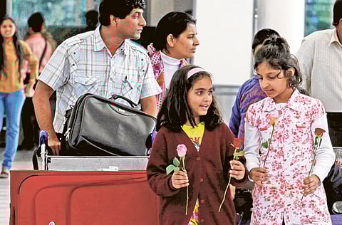 An Indian family arriving at Mumbai airport. Indian Ministry issues new advisory to quarantine Indians on arrival from coronavirus hit countries
