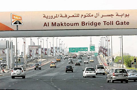 Motorists crossing Al Makhtoum Bridge will not have to pay Salik toll on Sundays-- the new weekly off day.