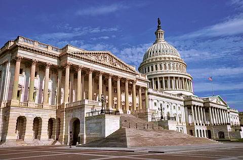 The East side of the US Capitol building. The US budget deficit more than tripled to a record $3.1 trillion in the latest fiscal year on the government'massive spending aimed at softening the blow from the coronavirus pandemic.