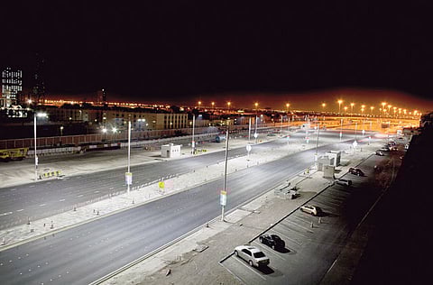 The speeding biker hit the pavement and crashed into a lamp post