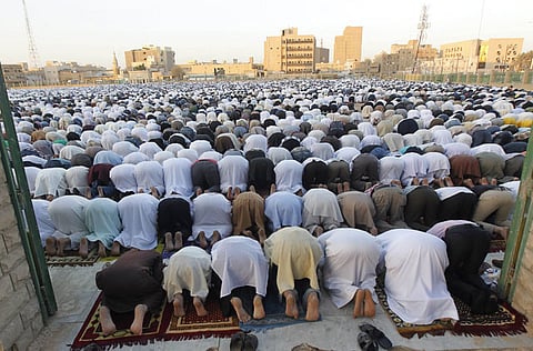 This file picture shows people in Saudi Arabia take part in prayers for Eid Al Adha in Riyadh.