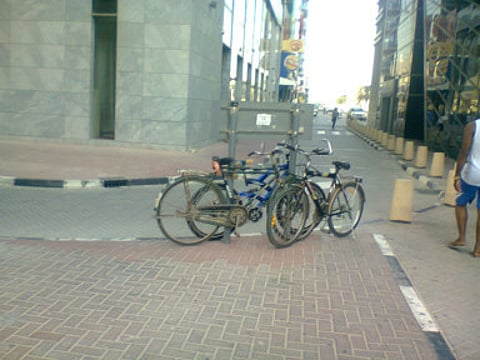 Bikers in need of bicycle stands at metro stations